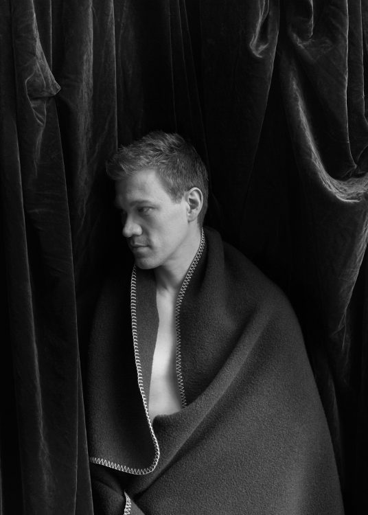 black and white Portrait of the actor Nils Kreutinger.