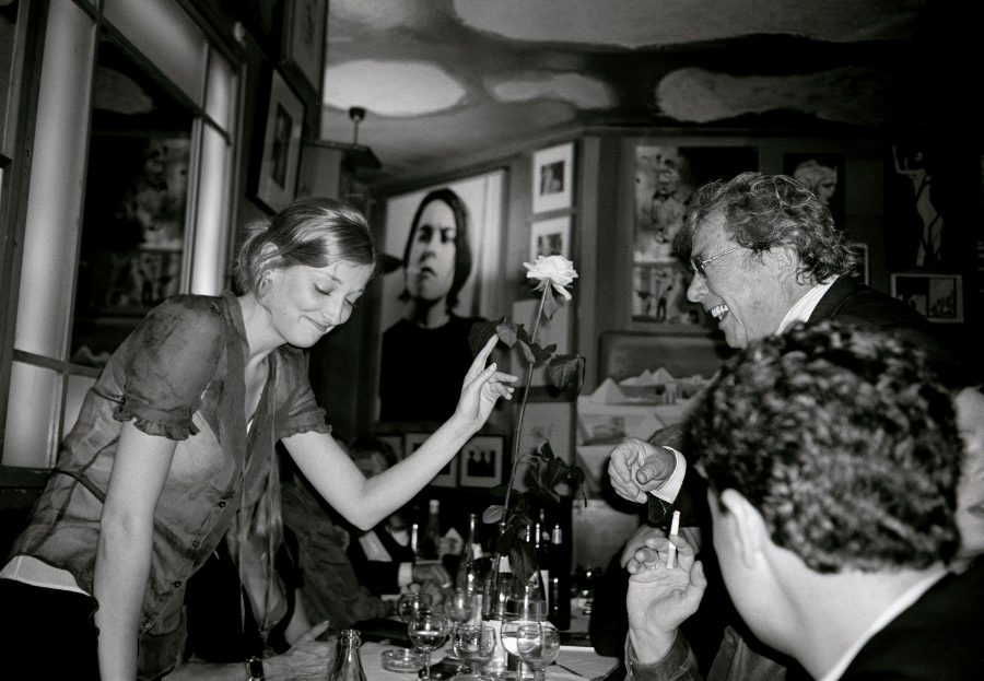 Alexandra Maria Lara and Hellmuth Karasek entertained laughing in the Paris bar.