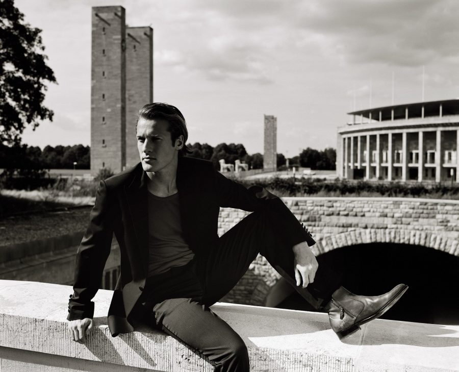 André Niklaus poses for a portrait by the Olympiastadion in Berlin.
