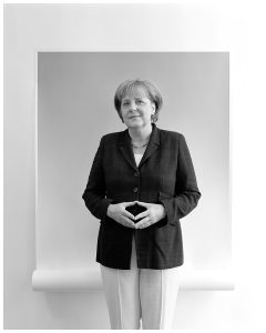 Angela Merkel showing her trademark gesture, the Merkel-Raute, at portrait photograph.