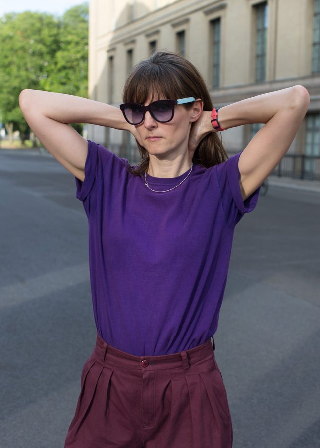German Artist Eva Berendes wearing a purple outfit.