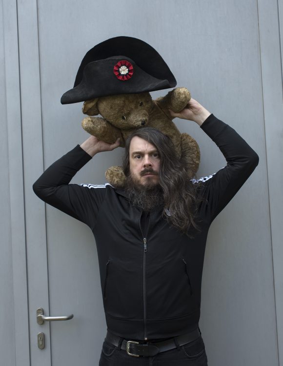 Jonathan Meese with Napoleon Hat and Teddy bear.