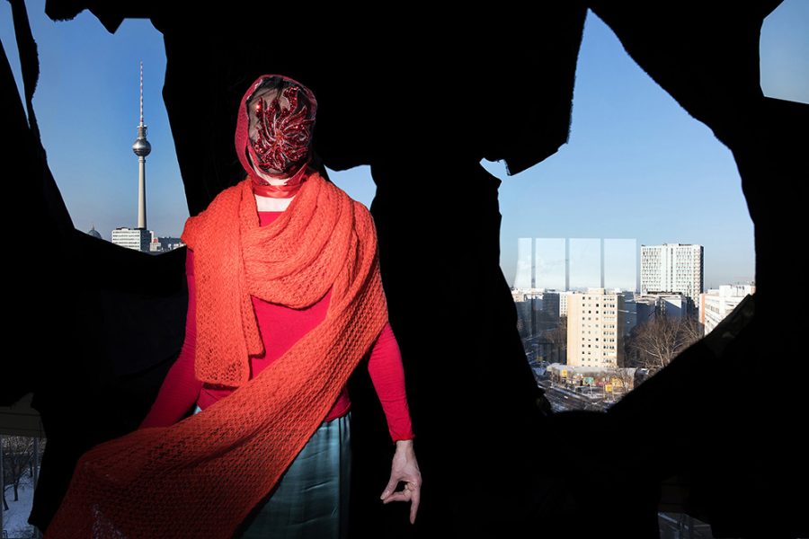 veiled woman in front of the Berlin skyline in Lockdown II.