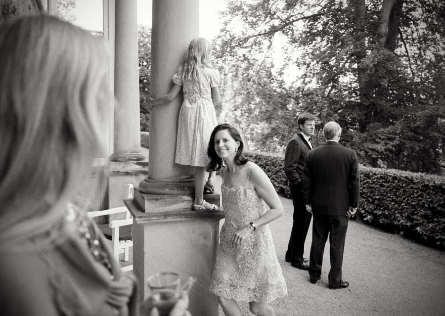 Black and white photo of Maximilian Hereditary Prince of Bentheim-Tecklenburg and his wife Marissa at their summer party.