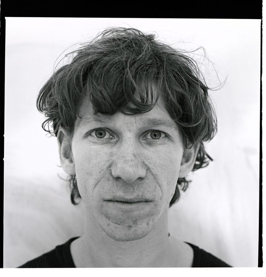 black and white close up portrait of Michel Majerus.