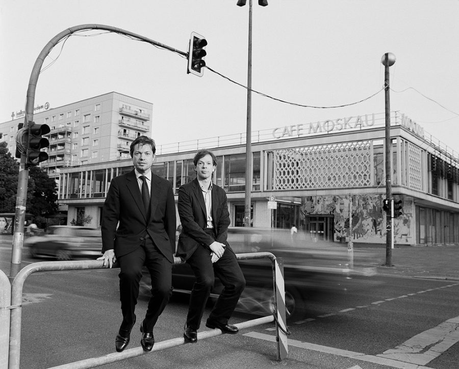 Nicolas Berggruen and Olivier Berggruen photographed in front of Cafe Moscow in Berlin.