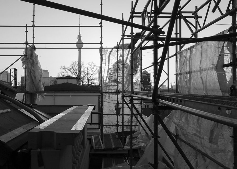 Scaffolding with TV tower and Berlin Cathedral in the background.