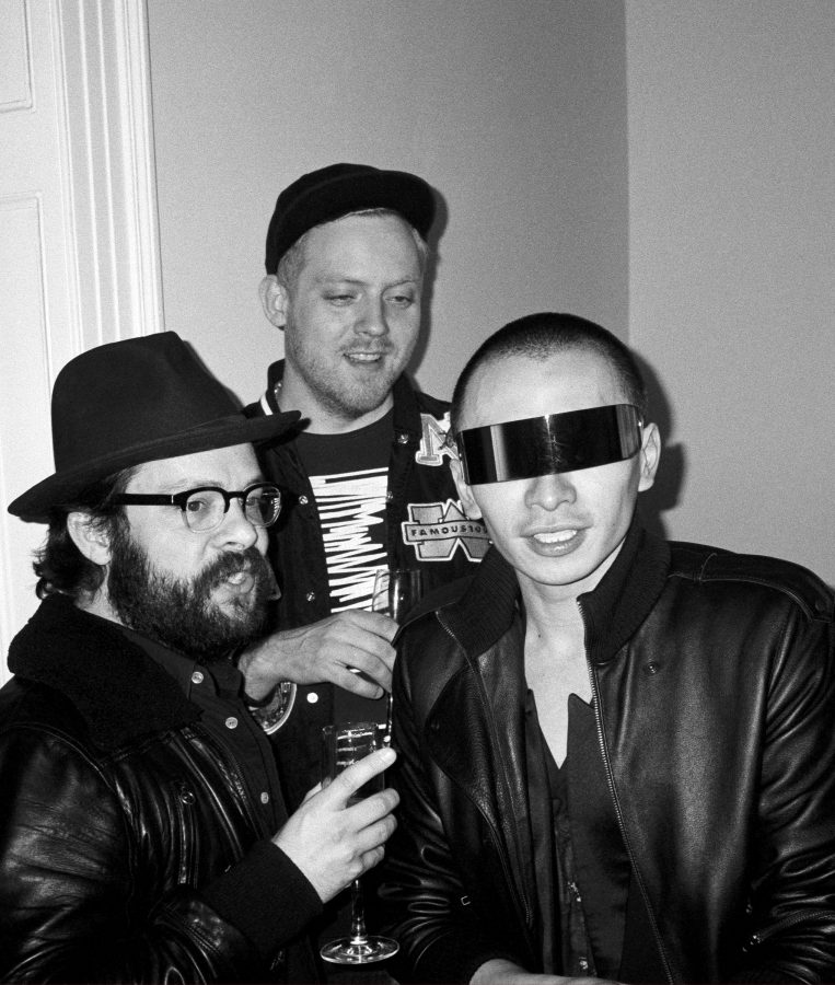 black and white portrait of the artist Terence Koh and friends at Angelika Taschnen's party.