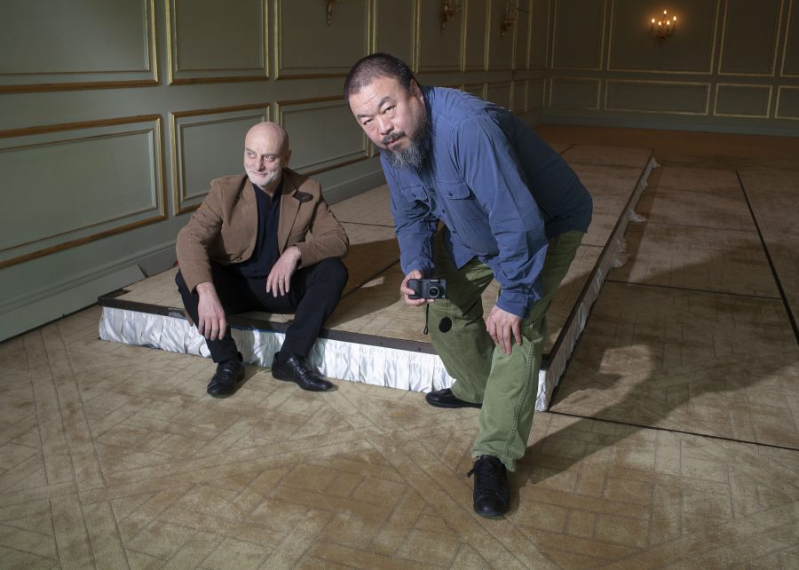 Uli Sigg with Ai Weiwei who is taking a picture of Oliver Mark.