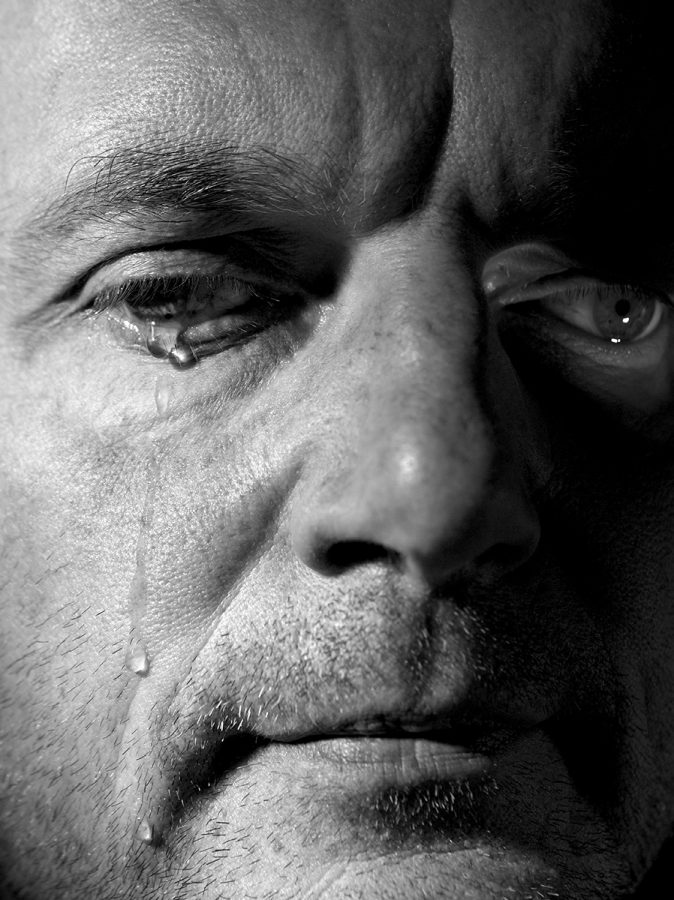 Black and white photo of Via Lewandowsky crying.
