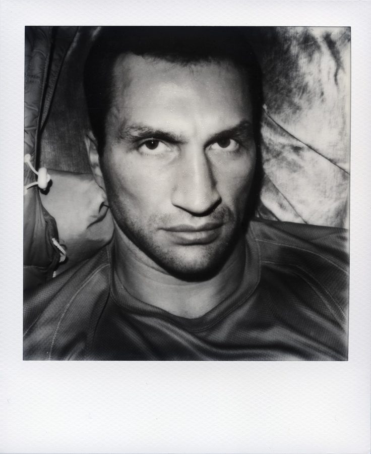 Close-up polaroid picture of Wladimir Klitchko lying in bed.